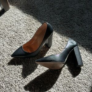 Used black black heel pumps
